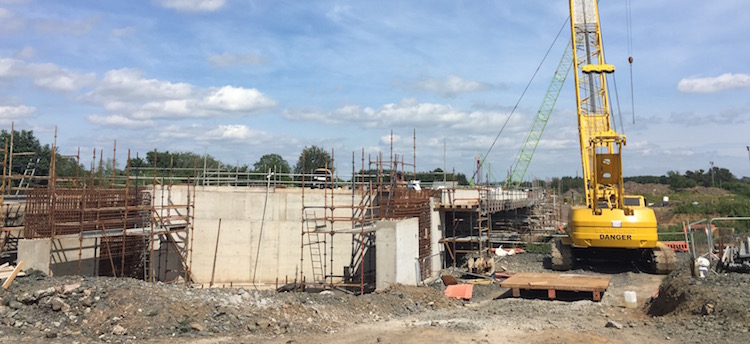 Crane beside Moyola Bridge with beams and
                          deck in place