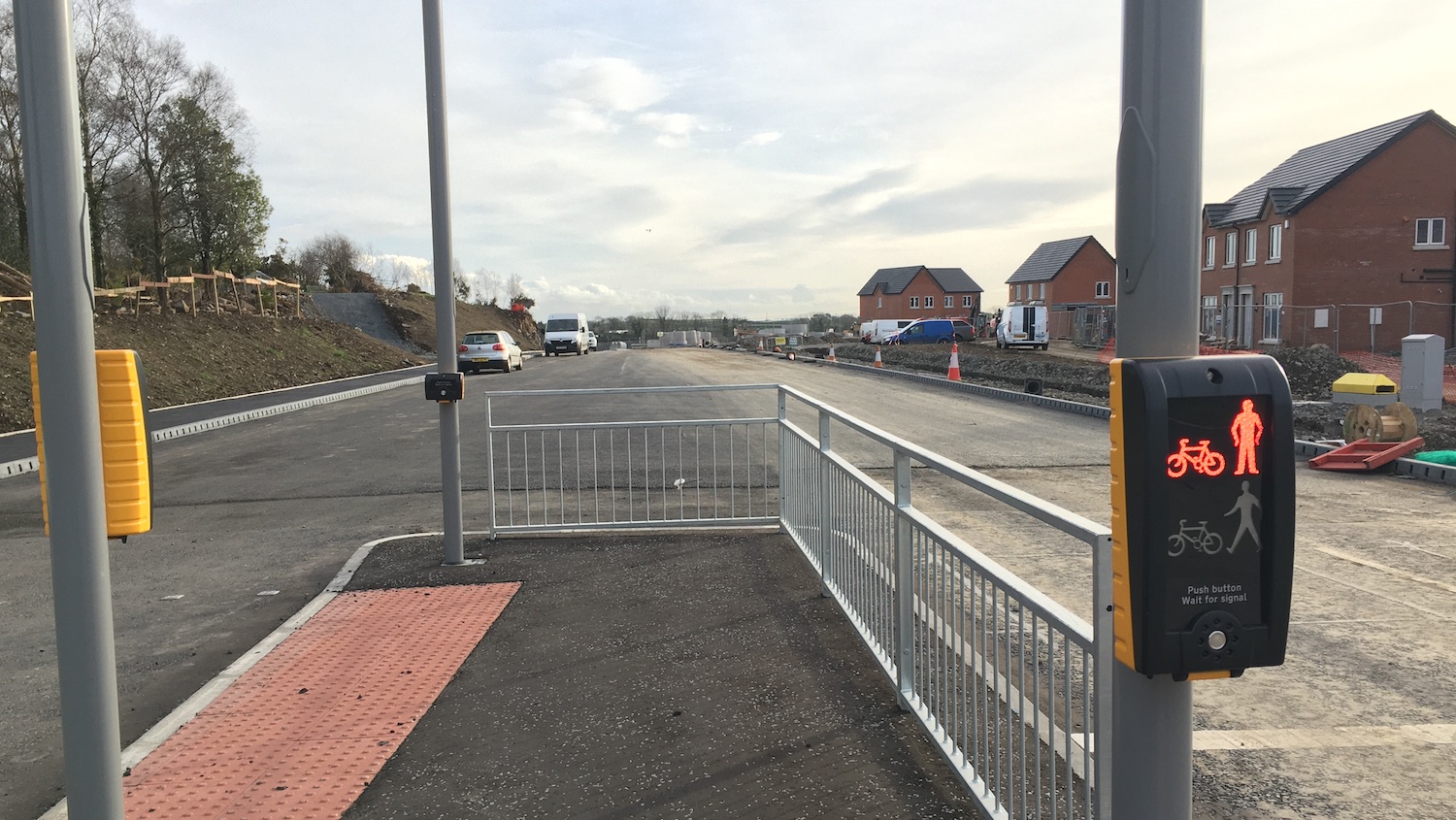 View from a traffic island along a new
                          road with no lane markings yet painted.